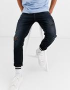 Asos Design Carrot Fit Jeans In Washed Black With Abrasions