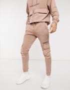 Asos Unrvlld Spply Oversized Matching Sweatpants In Washed Tan With Printed Logo-brown