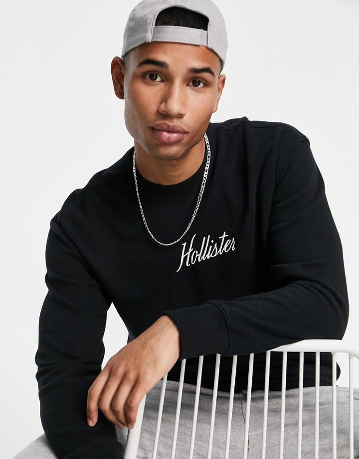 Hollister Script Chest Logo Sweatshirt In Black