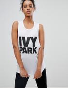 Ivy Park Drop Armhole Logo Tank Top In White - White