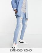 Asos Design Spray-on Jeans In Power Stretch In Light Wash With Hem Detail-blue