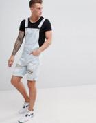Asos Design Denim Short Overalls In Light Wash Blue With Heavy Rips - Blue