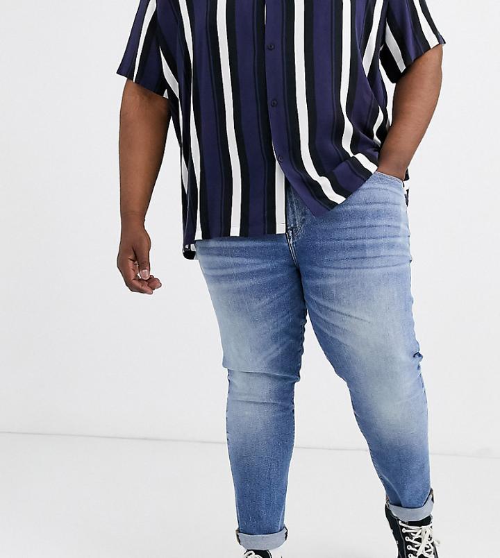 Asos Design Plus 12.5oz Skinny Jeans In Vintage Mid Wash Blue
