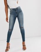 Asos Design Lisbon Mid Rise Skinny Jeans In Extreme Dark Stonewash With Knee Rips