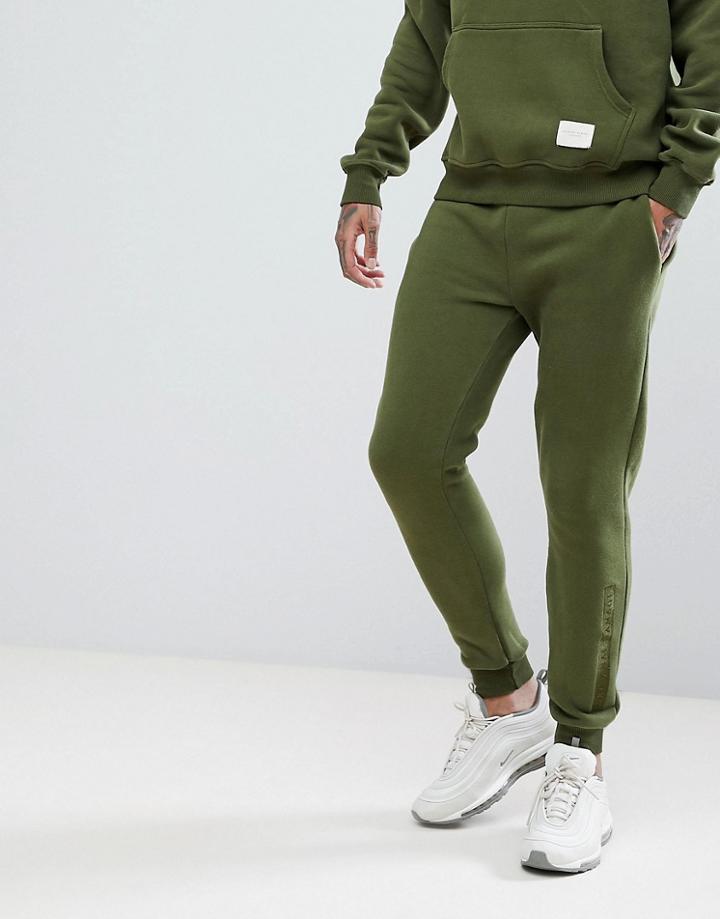 Criminal Damage Skinny Logo Joggers In Khaki - Green
