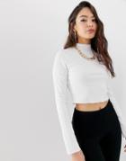 Asos Design Long Sleeve Crop Top With Turtleneck And Raw Hem In Rib In White