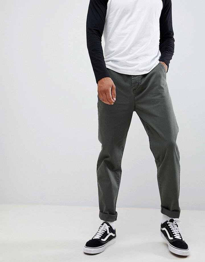 Asos Design Skater Chinos In Dark Green Wash With Turn Up - Green