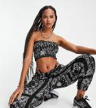 Puma Off Beat Paisley Print Sweatpants In Black