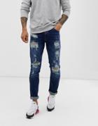 Asos Design Slim Jeans In Dark Wash Blue With Heavy Rips