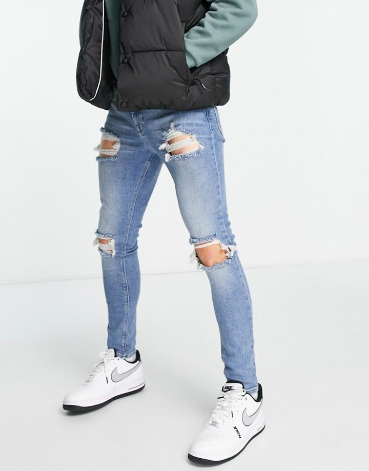 Asos Design Spray On Jeans With Power Stretch And Rips-blue