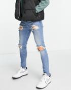 Asos Design Spray On Jeans With Power Stretch And Rips-blue