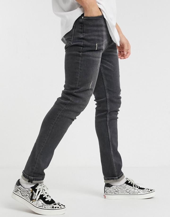 Asos Design Skinny Jeans In Washed Black With Abrasions