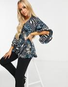 Ax Paris Ruffle Wrap Blouse In Mixed Animal Print-multi
