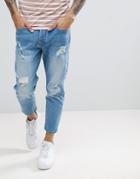 Solid Tapered Cropped Jeans With Rips In Light Blue - Blue