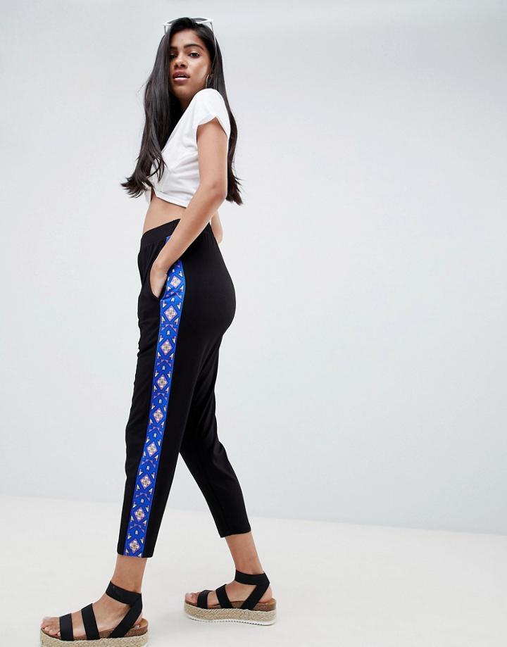 Asos Design Tapered Peg Pants With Geo-tribal Print Side Stripe - Black