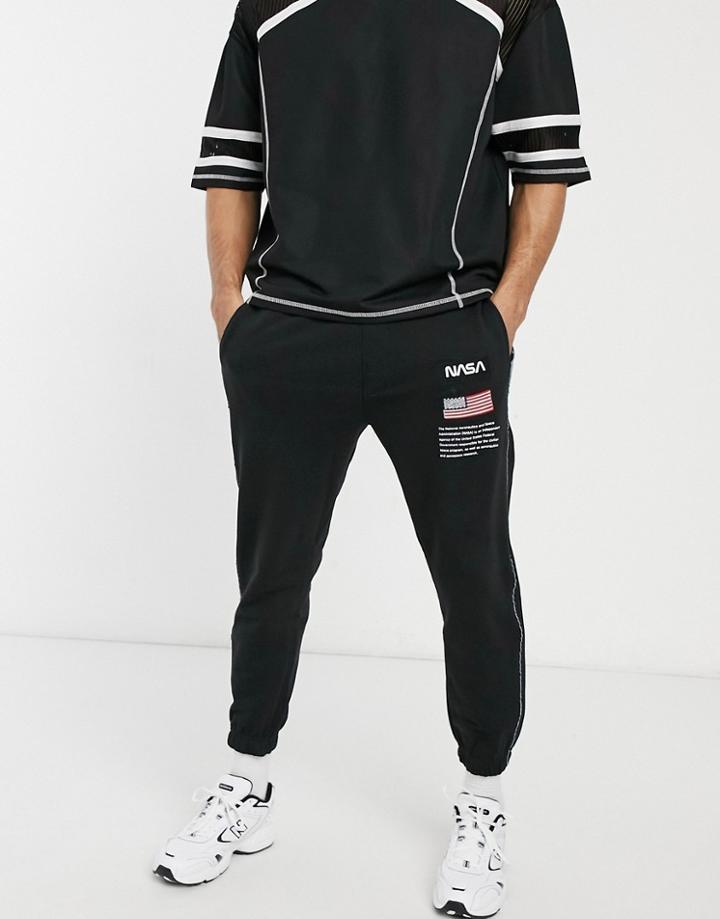Pull & Bear Nasa Sweatpants With Print And Piping In Black