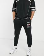 Pull & Bear Nasa Sweatpants With Print And Piping In Black
