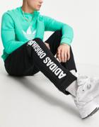 Adidas Originals United Sweatpants In Black