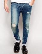 Asos Extreme Super Skinny Jeans With Rips - Blue