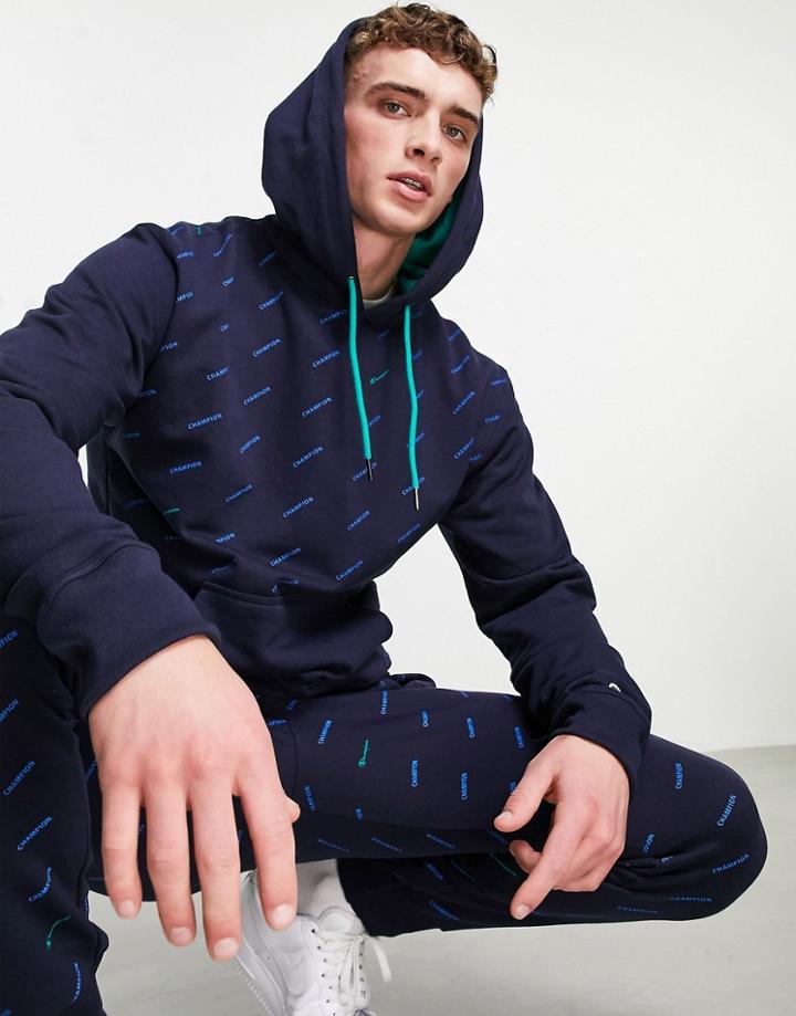 Champion All Over Logo Print Sweatshirt In Navy
