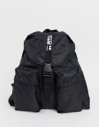 Asos Design Backpack In Black With Double Front Pockets And Slogan Strap