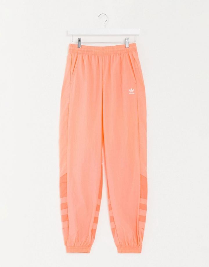 Adidas Originals Large Trefoil Track Pant In Coral-orange