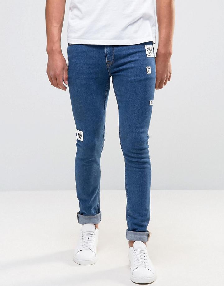 Asos Super Skinny Jeans In Mid Wash Blue With Badges - Blue