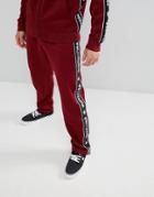 Dc Shoes Joggers With Logo Taping In Burgundy - Red