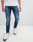 Armani Exchange J14 Skinny Fit 5 Pocket Stretch Jeans With Abrasions In Mid Wash - Blue