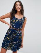 Yumi Belted Skater Dress In Butterfly Print - Navy