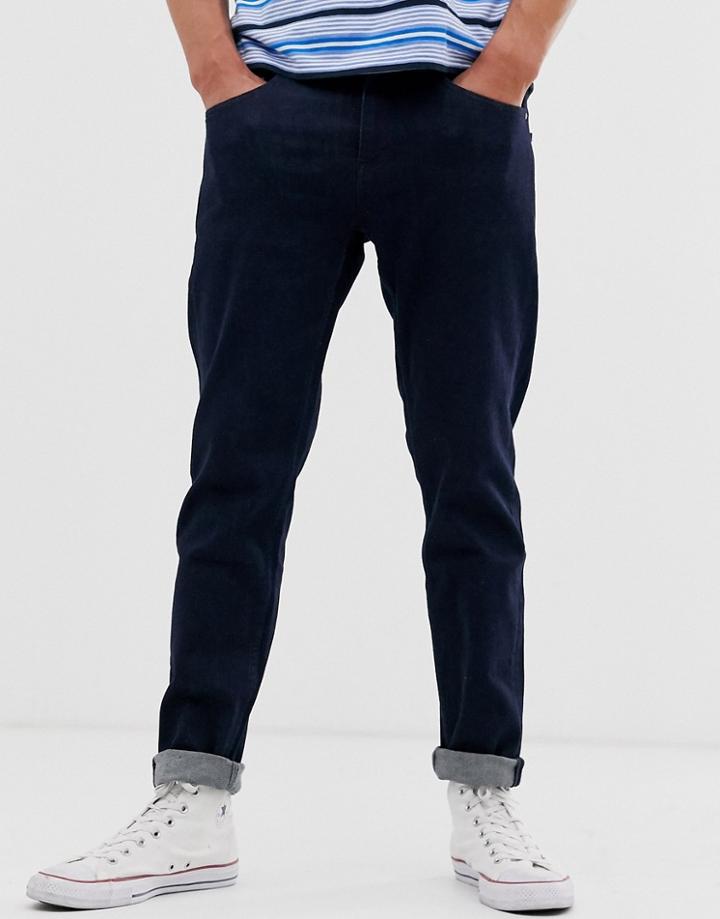 Asos Design Tapered Jeans In Indigo