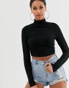 Asos Design Turtleneck Long Sleeve Rib Crop Top In Black - Black