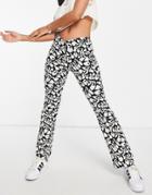 Topshop Dipped Waist Bengaline Flared Trouser With Zip Fly In Peace Print-multi