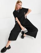 Asos Design Crew Neck Extreme Smock Texture Crepe Jumpsuit In Black