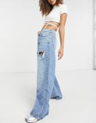 Bershka 90s Baggy Fit Jeans With Thigh Rip In Light Blue Wash-blues