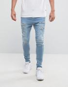 Siksilk Super Skinny Jeans In Light Wash With Distressing And Zips - Blue