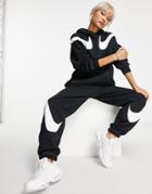 Nike Swoosh Pack Loose-fit Cuffed Fleece Sweatpants In Black
