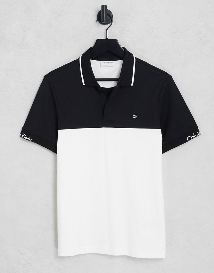 Calvin Klein Liquid Touch Blocking Logo Polo In White/black
