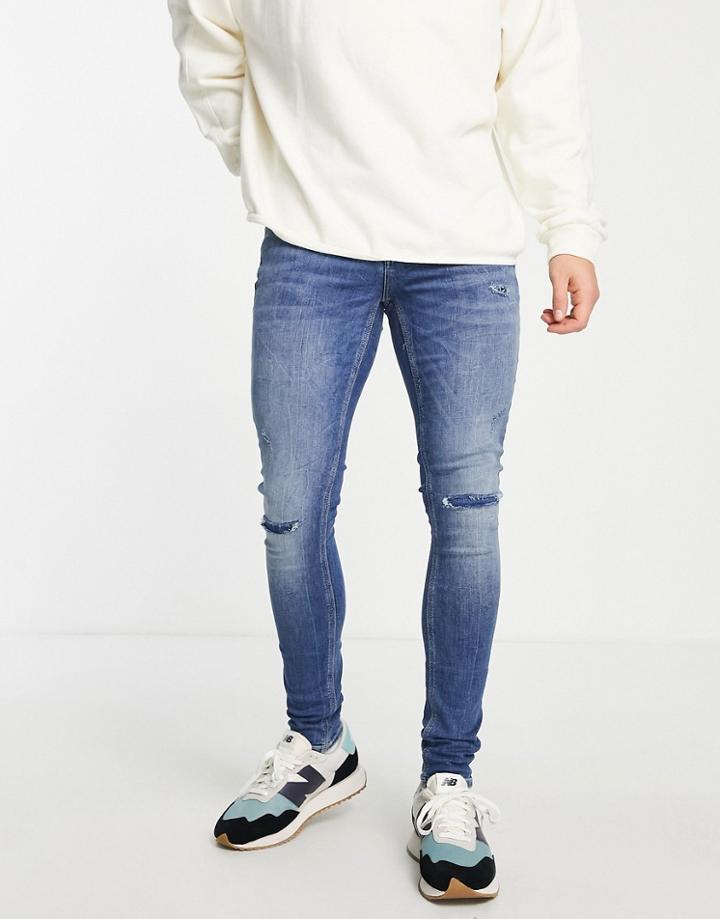 River Island Spray On Jeans With Rips In Medium Blue-blues