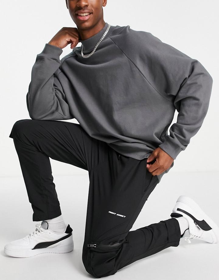 Night Addict Cargo Pants In Brown-black