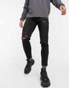 New Look Tapered Jeans With Rips In Black