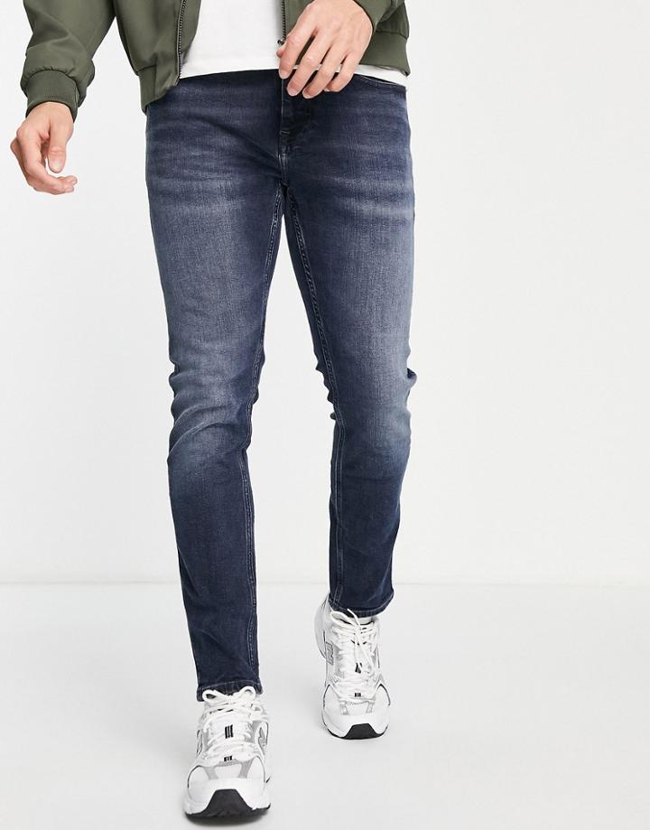 Tommy Jeans Austin Slim Tapered Fit Jeans In Dark Wash-blue
