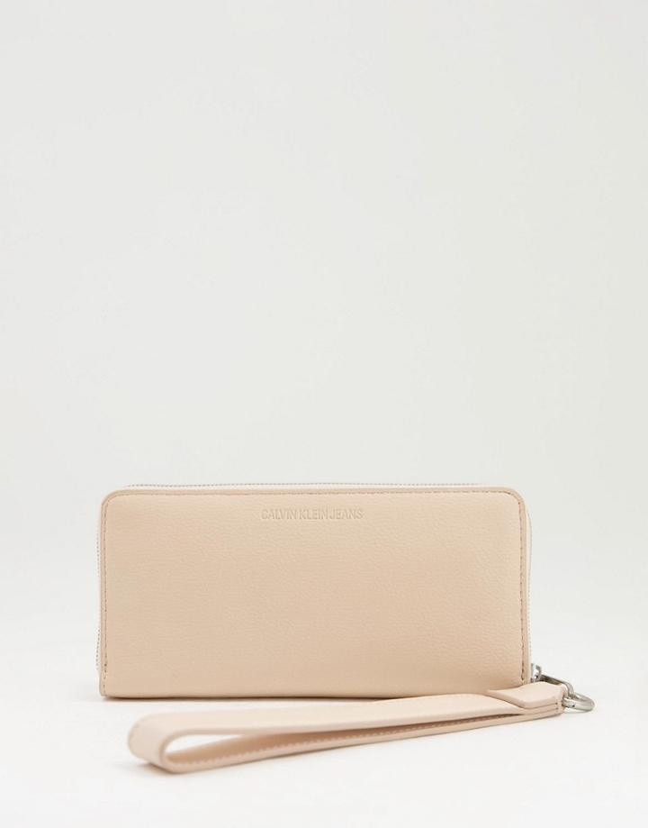 Calvin Klein Jeans Monogram Logo Wristlet Wallet In Cream-white