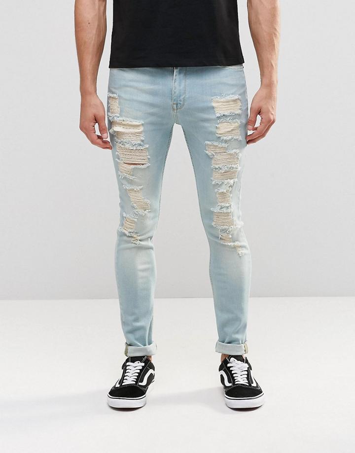 Asos Super Skinny Jeans With Extreme Rips In Mid Wash Blue - Light Blue