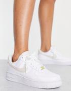 Nike Air Force 1 '07 Next Nature Sneakers In White And Gold Metallic