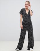 Asos Design Jumpsuit With Flutter Sleeve And Tie Back In Star Print-multi