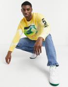 Levi's Relaxed Fit Humor Logo Arm & Front Print Long Sleeve Top In Shadow Lime Yellow