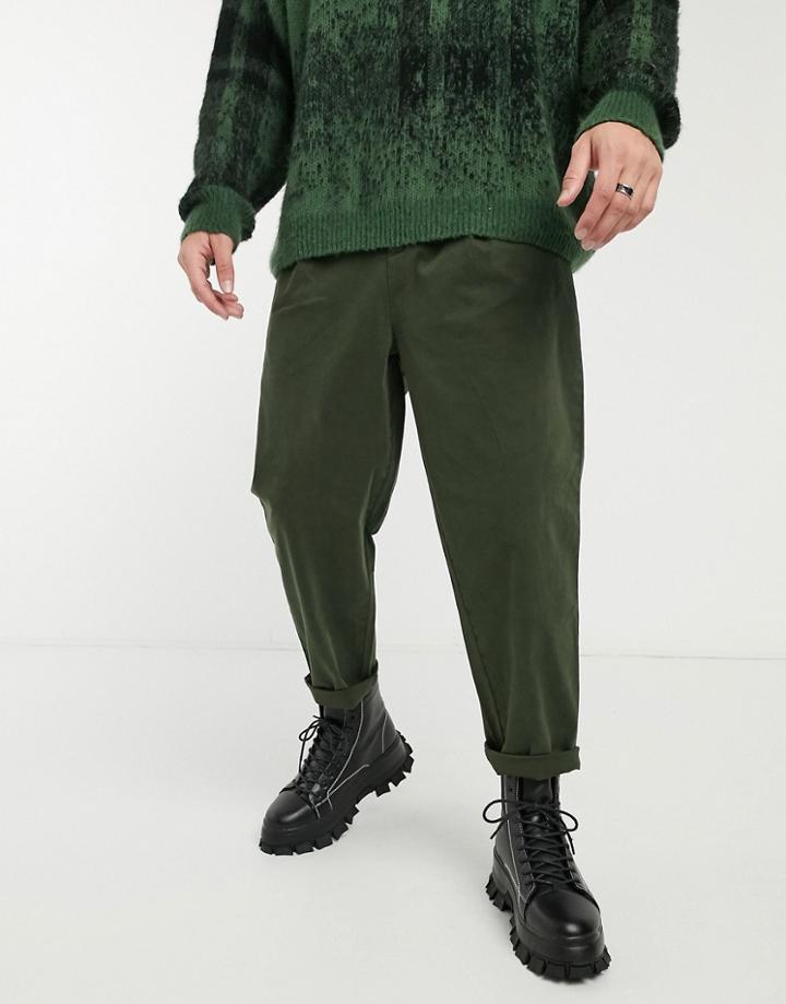 Asos Design Wide Leg Pants With Pleats In Khaki With Heavy Wash-green