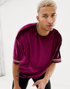 Asos Design Relaxed Longline T-shirt In Velour With Gold Neck And Sleeve Taping In Burgundy - Red