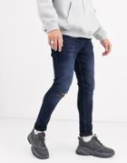 Asos Design Super Skinny Jeans In Blue Black With Busted Knees
